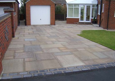 Completed driveway and garage.