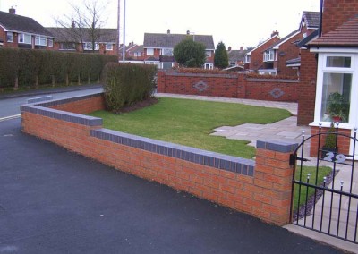 Completed boundary wall and garden.